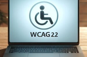 Laptop z napisem WCAG 2.2. audyt WCAG2.2, audyt dostępności.
